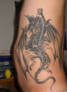 My second tattoo, a silver dragon running up my left side